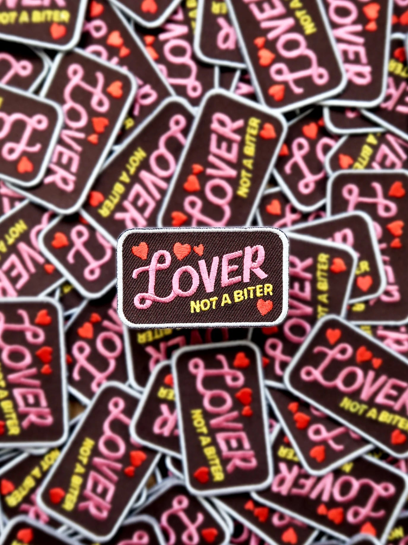 Badge "Lover not a Biter"